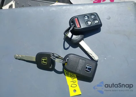 2010 Honda Odyssey Ex z USA, uszkodzony, nr VIN 5FNRL3H48AB038702